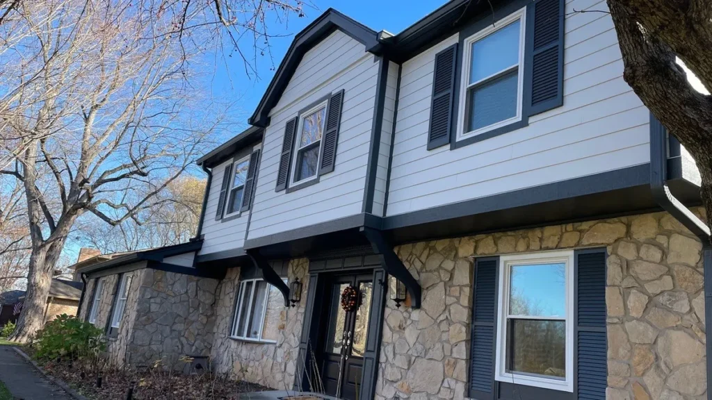 house after open box roofing installed brand new fiber cement siding