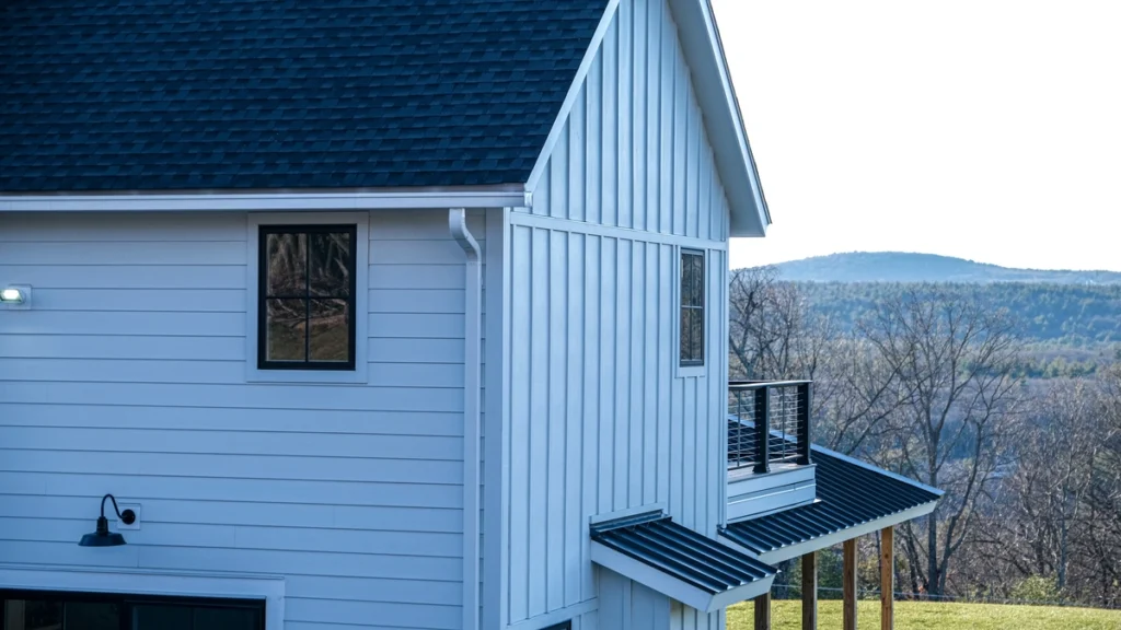 side-view of white house with new james hardie siding