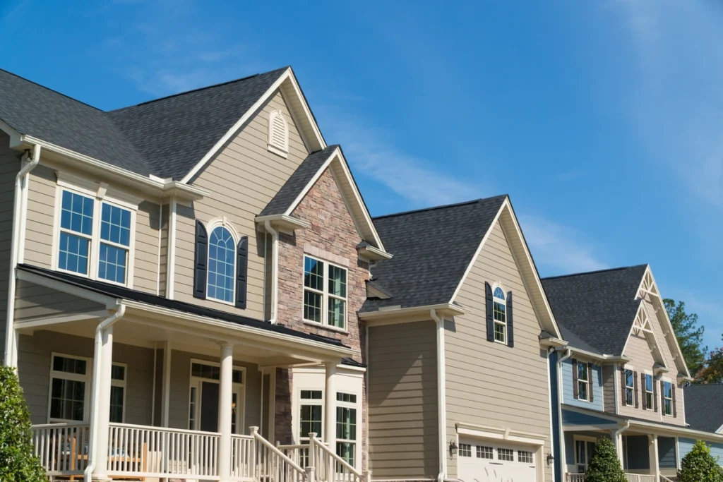 Residential roofs installed with asphalt shingle roofing materials