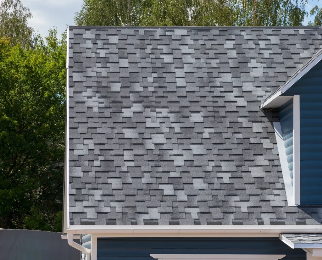 closeup of architectural shingle roof to be inspected for avg cost