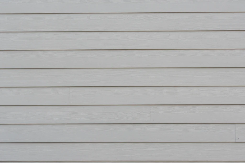 cream siding of house