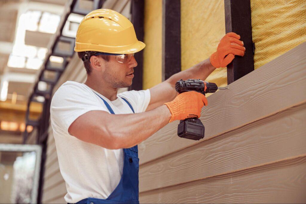 a siding expert installing siding